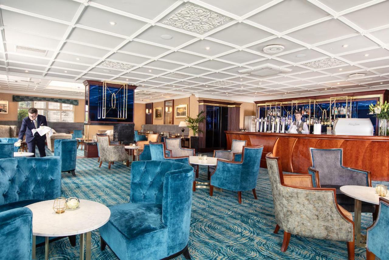 The Culloden Estate And Spa Холівуд Екстер'єр фото The interior of the lounge